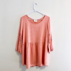 Peplum top with crochet sleeve detail